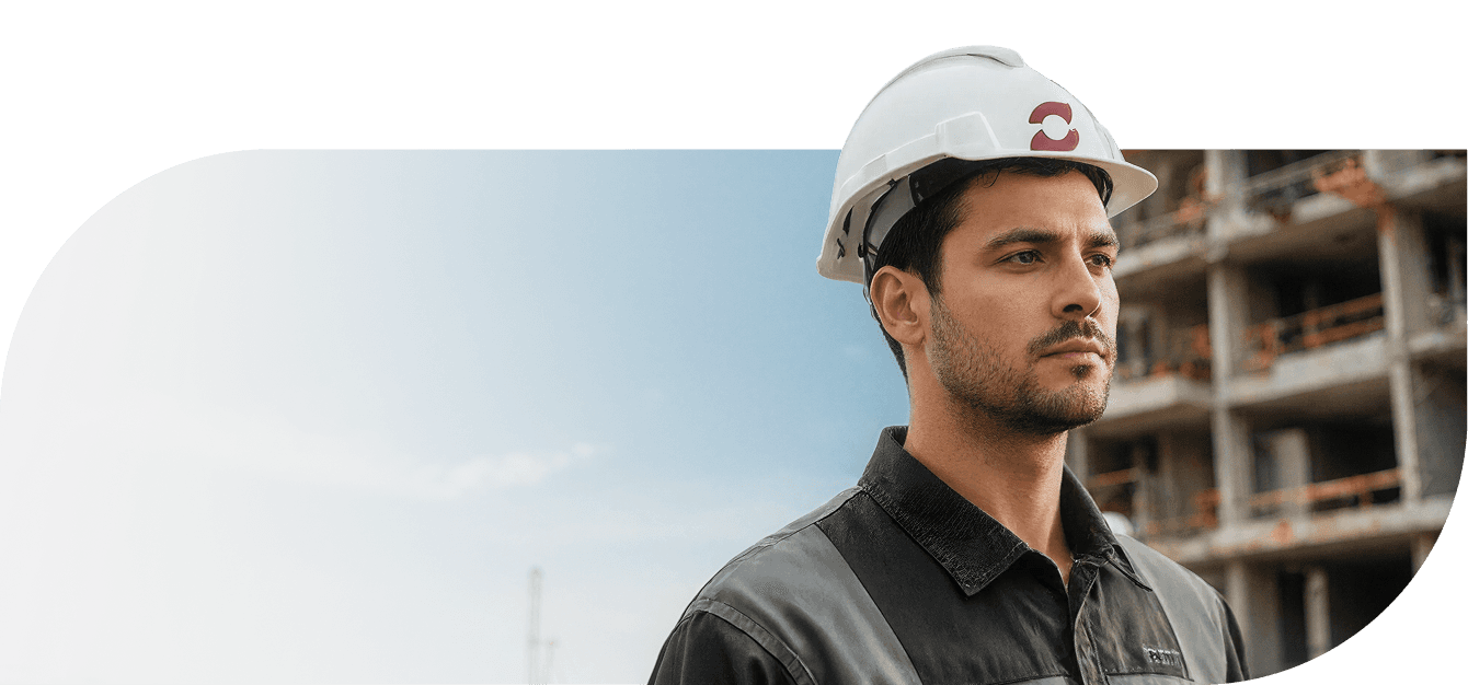 Operário em obra Eztec — bairros planejados, parcerias com arquitetos